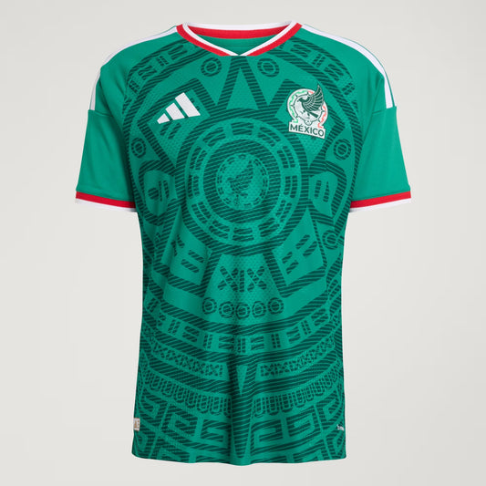 Green soccer jersey with black patterns on a light gray background